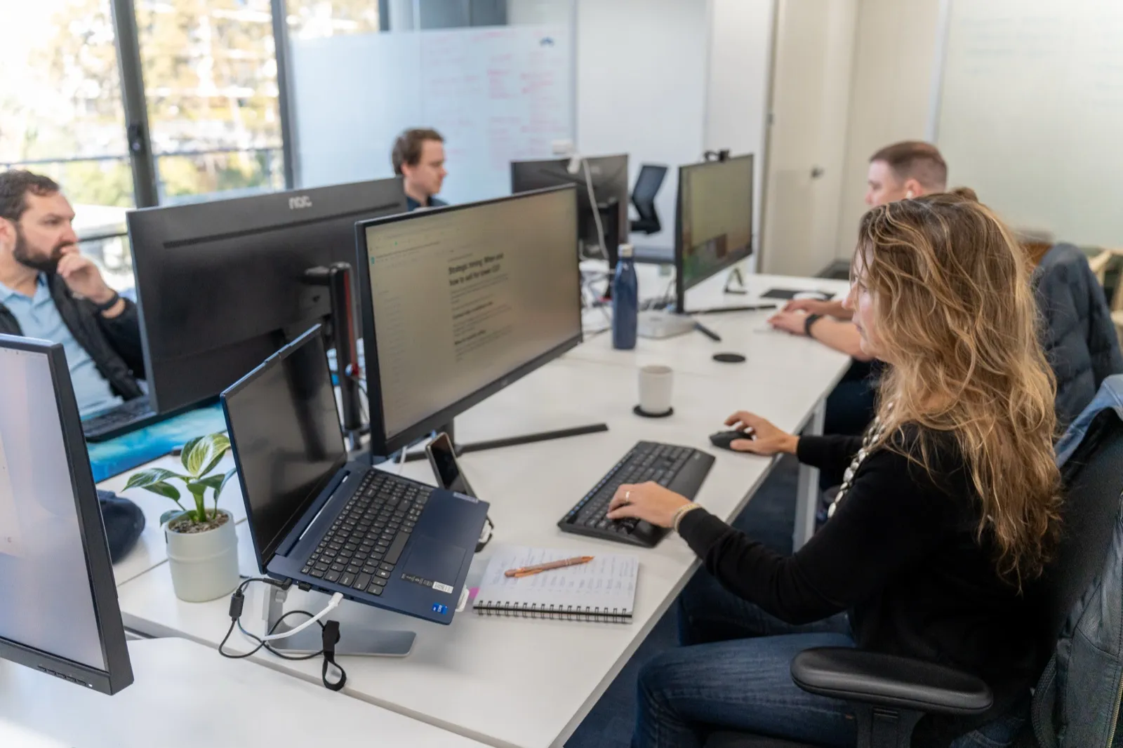 Earned Media and Content Department reviewing video brief